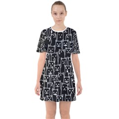 Funny Cat Pattern Organic Style Minimalist On Black Background Sixties Short Sleeve Mini Dress by genx